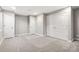 Large bedroom with neutral walls, carpet and two closets at 11482 Colony Loop, Parker, CO 80138