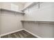 Walk-in closet with carpet and built in shelving with lots of space at 11482 Colony Loop, Parker, CO 80138