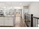 Bright, open-concept kitchen with a granite-topped island and stainless steel appliances at 11482 Colony Loop, Parker, CO 80138