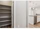 Spacious walk-in pantry with open shelving conveniently located near the kitchen at 11482 Colony Loop, Parker, CO 80138