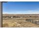 Sprawling backyard overlooking a captivating landscape view from the property at 668 Leafy Aster Ln, Castle Rock, CO 80104