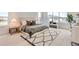 Bright bedroom featuring large windows, neutral tones, and stylish furnishings at 668 Leafy Aster Ln, Castle Rock, CO 80104
