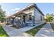 Charming exterior showcasing detailed architectural features and inviting porch at 1739 E Martin Luther King Jr Blvd, Denver, CO 80205
