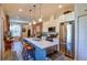 Modern kitchen with stainless steel appliances, a center island, and pendant lighting at 1739 E Martin Luther King Jr Blvd, Denver, CO 80205