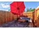 Cozy backyard patio with a comfortable outdoor seating area and privacy fence at 1739 E Martin Luther King Jr Blvd, Denver, CO 80205