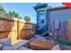 Private backyard patio area featuring comfortable seating and a charming architectural backdrop at 1739 E Martin Luther King Jr Blvd, Denver, CO 80205