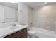 Clean basement bathroom with a shower/tub combo and modern vanity at 4727 Raven Run, Broomfield, CO 80023