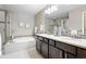 Double vanity bathroom with soaking tub and shower at 4727 Raven Run, Broomfield, CO 80023