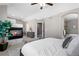 Main bedroom with fireplace and ensuite bathroom at 4727 Raven Run, Broomfield, CO 80023
