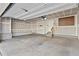 Unfinished two-car garage with extra storage space at 4727 Raven Run, Broomfield, CO 80023