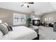Main bedroom with fireplace and sitting area at 4727 Raven Run, Broomfield, CO 80023