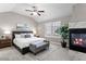 Spacious main bedroom with fireplace and sitting area at 4727 Raven Run, Broomfield, CO 80023