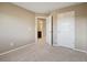 Bedroom with carpet and access to a bathroom at 6792 Longpark Dr, Parker, CO 80138