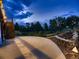 Serene backyard with a patio, wooden fence, and landscaping at 9412 Burgundy Cir, Highlands Ranch, CO 80126