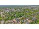 Expansive aerial view of a well-maintained neighborhood with tree canopies covering residential homes and buildings at 2340 S Columbine St, Denver, CO 80210