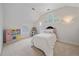 Cozy bedroom with a bed, play kitchen and toy shelf at 2340 S Columbine St, Denver, CO 80210