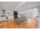 Bright living room with hardwood floors, fireplace and built-in shelving at 2340 S Columbine St, Denver, CO 80210