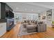 Open-concept living room with fireplace, hardwood floors, and elegant decor at 2340 S Columbine St, Denver, CO 80210