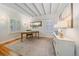 Bright home office with natural light, white beamed ceilings, and stylish decor at 2340 S Columbine St, Denver, CO 80210