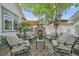 Inviting outdoor space featuring a stone fireplace, comfortable seating, and a cozy ambiance for relaxation and entertainment at 2340 S Columbine St, Denver, CO 80210