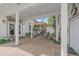 Covered outdoor patio with fireplace, seating area, and water feature at 2340 S Columbine St, Denver, CO 80210