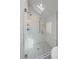 Shower featuring herringbone tile, glass enclosure, and dual shower heads at 2340 S Columbine St, Denver, CO 80210