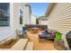 Charming back patio with stylish outdoor seating, perfect for relaxing and entertaining at 10700 Kimblewyck Cir # 155, Northglenn, CO 80233