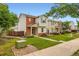 Charming townhome with well-manicured lawn and inviting entrance at 10700 Kimblewyck Cir # 155, Northglenn, CO 80233