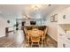 Open-concept living room with hardwood floors, modern decor, and plenty of natural light at 10700 Kimblewyck Cir # 155, Northglenn, CO 80233
