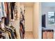 Well-organized walk-in closet offering ample storage space for clothing and accessories at 10700 Kimblewyck Cir # 155, Northglenn, CO 80233