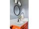 Updated bathroom featuring sleek fixtures, a modern countertop, and a vanity at 5190 E Asbury Ave, Denver, CO 80222