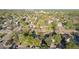 Aerial perspective of a neighborhood showcasing tree-lined streets and various residential properties at 1248 Meadow St, Longmont, CO 80501