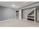 Finished basement with built in under-stair storage and easy access to other finished space at 1248 Meadow St, Longmont, CO 80501