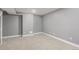 Finished basement with modern recessed lighting and plush gray carpet at 1248 Meadow St, Longmont, CO 80501