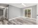 Living room with sliding glass doors and wood floors at 1248 Meadow St, Longmont, CO 80501