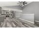 Open concept kitchen and living room with gray walls, modern floors and stainless steel appliances at 1248 Meadow St, Longmont, CO 80501