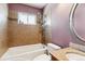 Updated bathroom with tile flooring and shower at 11418 Fowler Dr, Northglenn, CO 80233