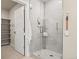 Modern bathroom with glass-enclosed shower and built-in shelving at 20 Wilcox # 421, Castle Rock, CO 80104