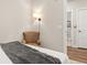 Cozy bedroom featuring a chair with lamp and ensuite bathroom at 20 Wilcox # 421, Castle Rock, CO 80104