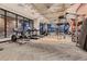 Community gym with treadmills, stationary bikes and weight training equipment at 20 Wilcox # 421, Castle Rock, CO 80104