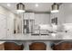 Contemporary kitchen with large island, stainless steel appliances, and modern finishes at 20 Wilcox # 421, Castle Rock, CO 80104