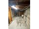 A large basement space with utilities, concrete floors, and exposed beams at 2625 W Ellsworth Ave, Denver, CO 80219