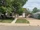 Quaint single-Gathering home with a well-maintained lawn and a covered carport providing sheltered parking at 2625 W Ellsworth Ave, Denver, CO 80219