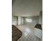 Spacious kitchen with tile floors, built-in cabinets, and a window for natural light at 2625 W Ellsworth Ave, Denver, CO 80219