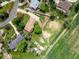 An aerial view highlights this property's backyard, horse property and bordering field at 2117 Stonehenge Cir, Lafayette, CO 80026