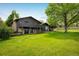 Spacious backyard with mature trees, providing an ideal outdoor space for recreation and relaxation at 2117 Stonehenge Cir, Lafayette, CO 80026