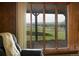 Breathtaking views of green pastures and snow-capped mountains from the living room window at 2117 Stonehenge Cir, Lafayette, CO 80026