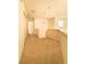 Upstairs hallway with neutral carpet and paint, closet, and natural light at 6407 S Dallas Ct, Englewood, CO 80111