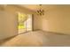 Bright room with sliding glass doors leading to the outside, showcasing natural light at 6407 S Dallas Ct, Englewood, CO 80111