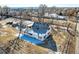 Aerial view of the home showcasing the roof and the surrounding mature trees at 5300 Balsam St, Arvada, CO 80002